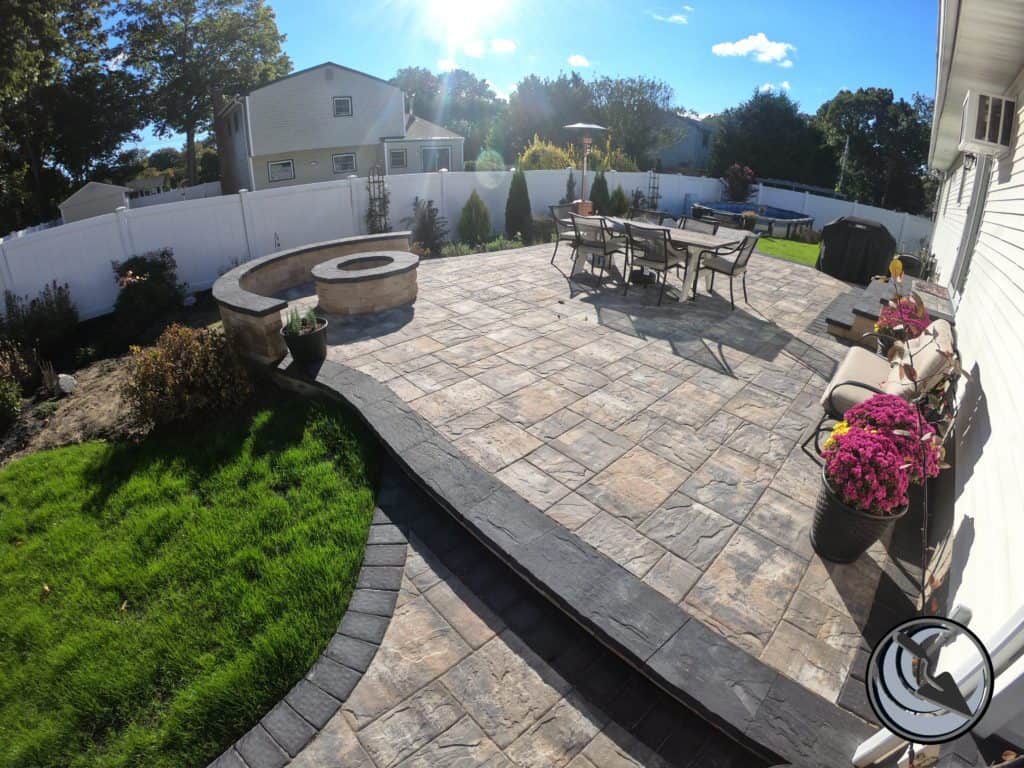 outdoor living patio design, cambridge paver installation, raised paver patio